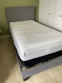 A single bed set, including headboard, frame, mattress, everythi