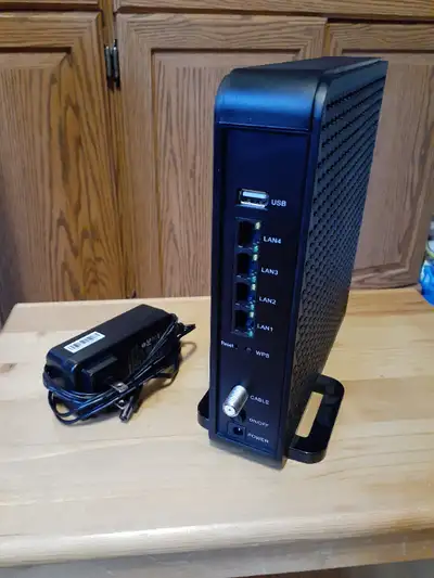 SMART/RG cable modem with WiFi +Power Supply. Works with Teksavvy Internet/Phone/TV. Model # is SR80...