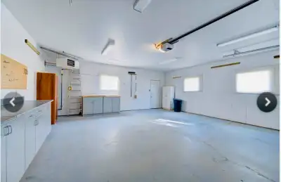 Bright spacious heated double detached garage with lots of storage. Perfect for parking and storage...