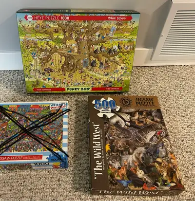 2 puzzles like new: 1) Funky Zoo - Marino Degano 1000 pieces 2) The Wild West animals photography by...