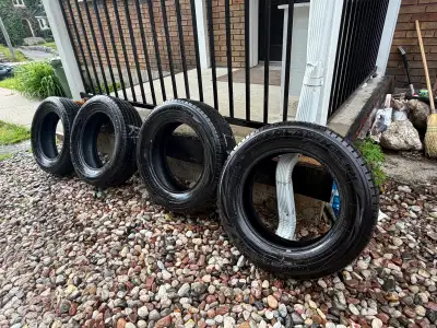 Set of 4 Yokohama Geolandar G91 tires. Size: 225/65R17 100H Removed from a Ford Maverick after upgra...