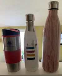 Water bottles and travel mug