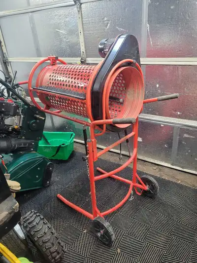 Electric standing soil screener. Folds for storage and moving. 15" drum diameter. Works great