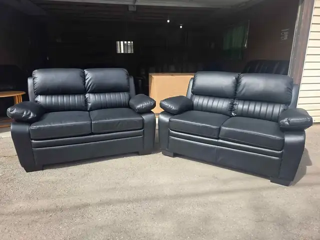 2+2 brand new black leather love seats. Free delivery & disposal