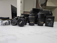 Nikon D3100 + 3 Lenses + 2 Batteries + Carrying Bag