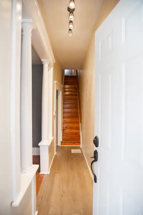 249 Princess Street welcomes you with century home details, like pine stairs, columns and architectu...