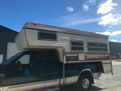 This 10.5’ foot truck camper is a reliable, pre-owned companion ready for your next outdoor adventur...