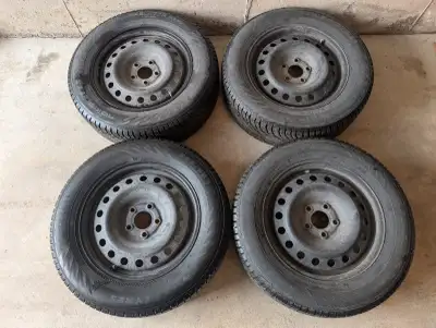 225/65R17 Winter Tires on Steel Rims Nokian Hakkapeliitta RS SUV 17” Dia., I believe 5x120 bolt patt...