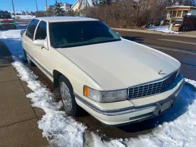 LOCATED IN LETHBRIDGE……Bough new in Lethbridge (Benys) Pearl white exterior, beige leather interior....