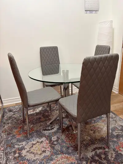 Beautiful round Glass Table with 4 free chairs, View more