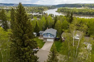 Welcome to your next home—an executive, custom-designed residence that balances warmth, comfort, and...