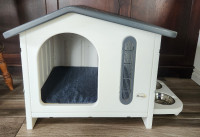 BRAND NEW! Adorable, durable indoor/outdoor dog house!