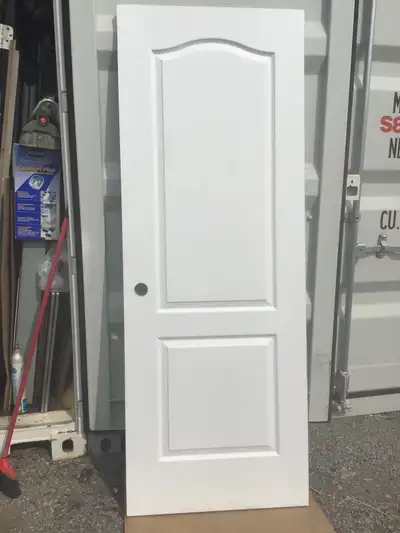 1 - Metrie 2-Panel Slab Door W/ ARCH- Primed Hardboard - Interior - 30” x 80”-in x 1 3/8” = $ 100.oo...