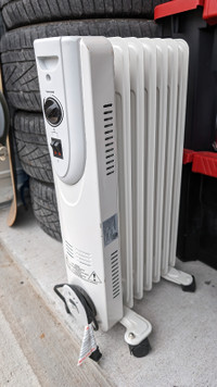 Oil filled radiator heater