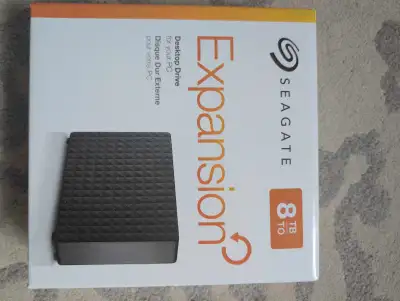 I'm selling a brand new, sealed Seagate Expansion 8TB external hard drive for your PC, offering subs...