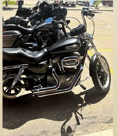 2005 Harley Davidson 1200XL - Custom black wrap - New front tire Asking $5500 or best offer.