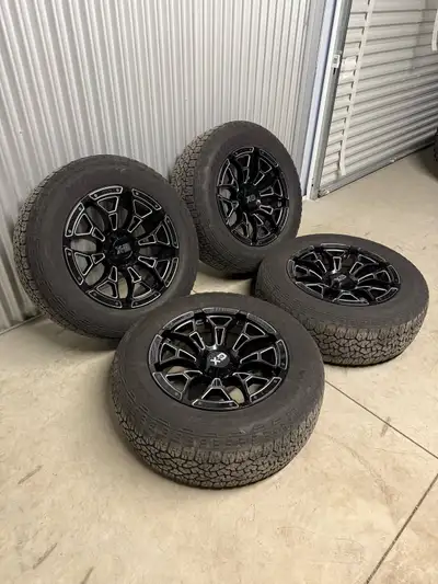 20x9” (0 offset) KMC “XD841 Boneyard” 5x139.7 bolt pattern rims + 275/60R20 (33”) Goodyear Wrangler...