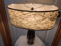 Mid Century Modern Table Lamp with an Ovoid Parchment Shade