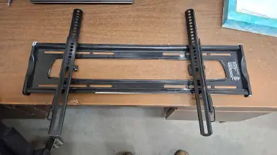 This is a wall mount for tvs with a max capacity of 130lbs and bolt pattern not wider than 35 1/4" c...