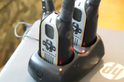 2 MOTOROLA RECHARGEABLE  WALKIE TALKIES/ AND CHARGER, View more