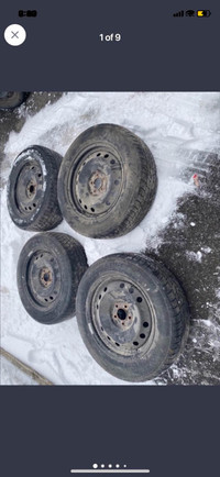 4 snow tires on steel rims 235/65/18 5x114.3 bolt pattern