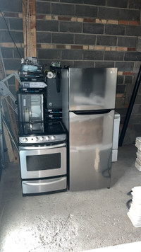 24” GE Stainless Steel Stove Glass top and a 22” LG FRIDGE 