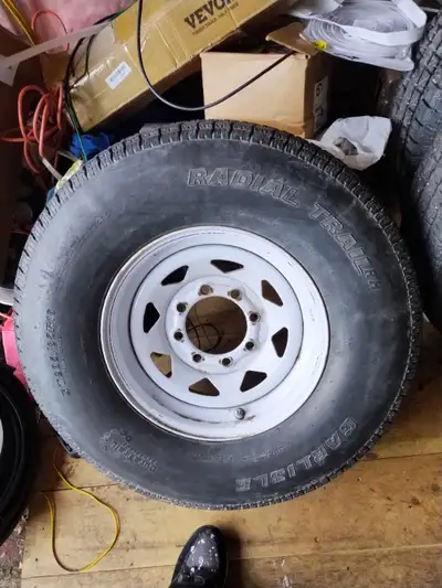 5 Tires 235/85/R16 all mounted on 8 bolt rims. Lots of tread on all of them