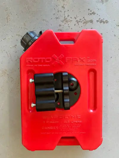 New, never used, 1 gallon rotopax with mount.