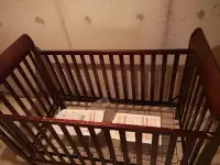 Wooden baby crib and mattress