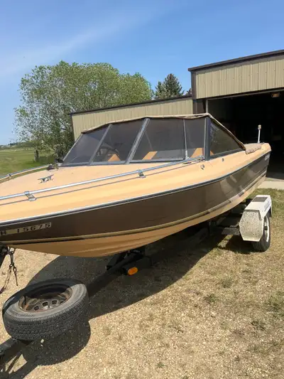 16 ft. Campion fiberglass boat with 115 hp. V4 Johnson outboard motor and Shorrider trailer on 175x7...