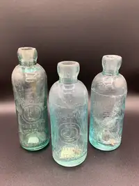 Felix J Quinn soda bottles