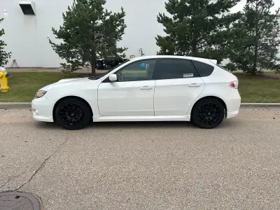 Selling my Subaru Impreza WRX hatchback. Car recently had the top end rebuilt with ARP head studs, 3...