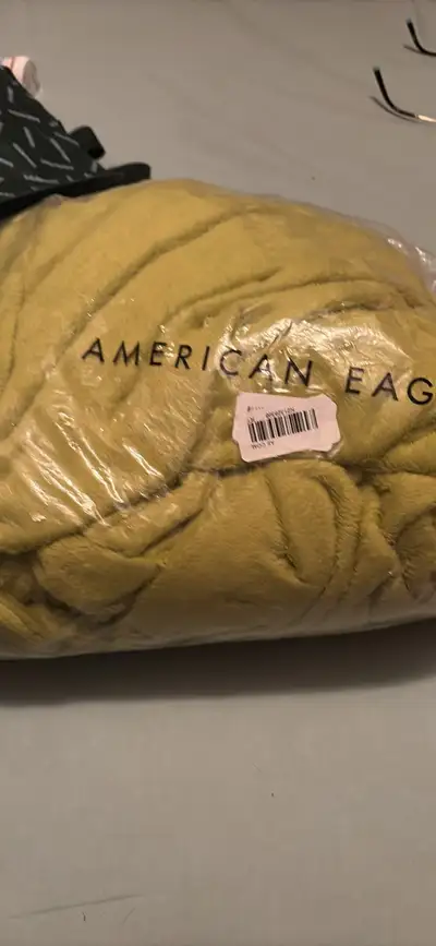 American eagle grinch poncho tags on, View more