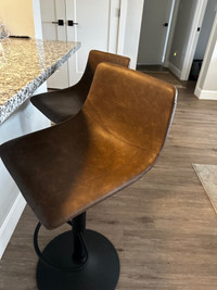 Set of 2 smooth, brown leather adjustable Bouclair stools