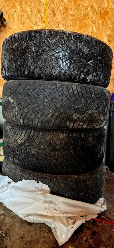 For sale is a set of used winter tires, sized 225/40R18, mounted on steel rims. These tires have see...