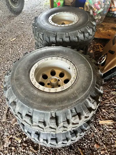 Set of 4 Interco Super Swamper TSL tires, size 36x12.50-15LT. This set of four tires is mounted on M...
