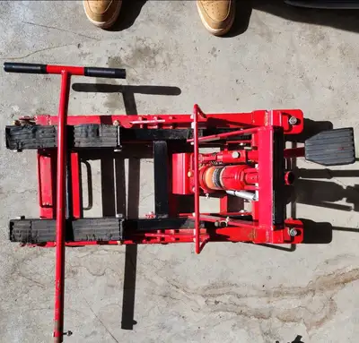 Like new, MotoMaster Complete Lift Motorcycle / ATV Jack with Removable Handle 1500-lb. Capacity: 1,...