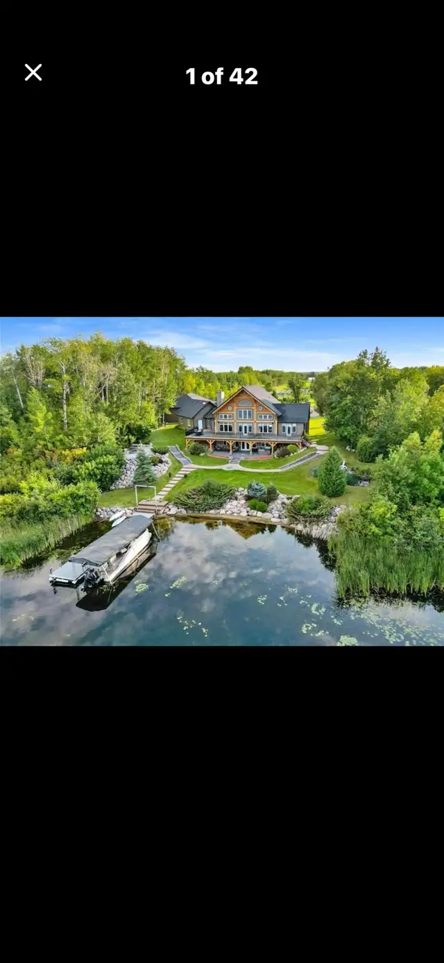 Exceptional Waterfront Timberframe in Manitoba
