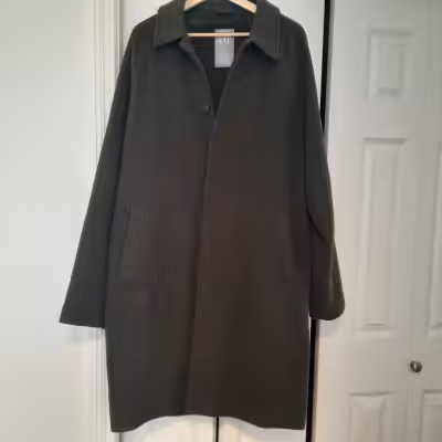 Dark Olive color men's wool coat. Was worn couple times. Very good shape. XL size. Shell: 48% wool,...