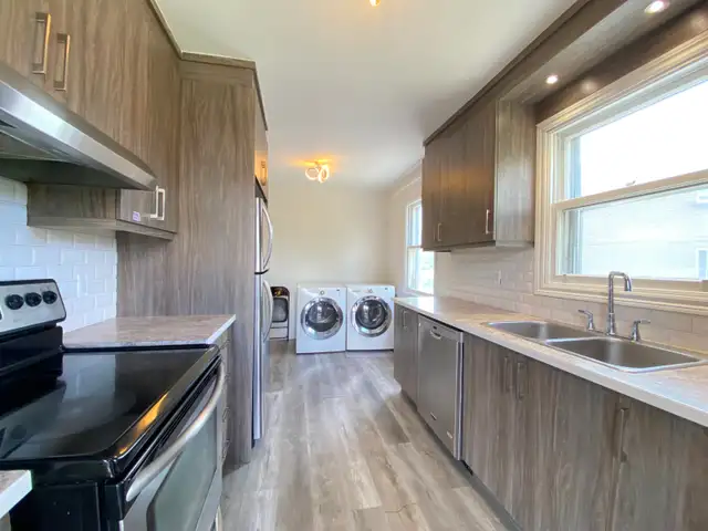 Spacieux appartement 5 ½ au rez-de-chaussée d’un triplex