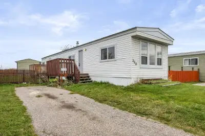 Lot fee $1250 includes water, sewer, garbage removal, and use of club house with fitness room. Affor...