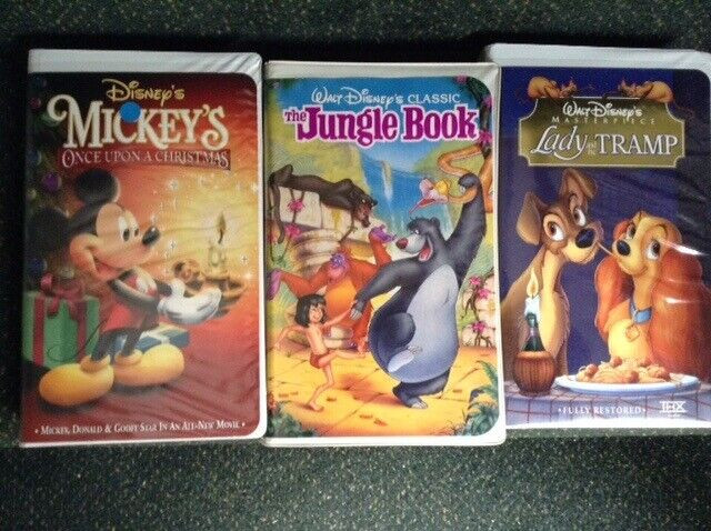 VHS WALT DISNEY. MICKEY CHRISTMAS, LADY & THE TRAMP dans CD, DVD et Blu-ray  à Ville de Montréal