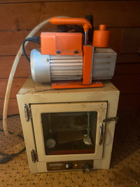 Vacuum oven and vacuum pump