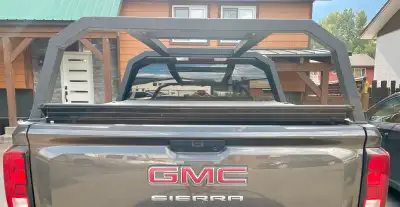 Custom aluminum truck rack coated with Line-X. Fits the accessory holes for a standard 6’6” bed on G...