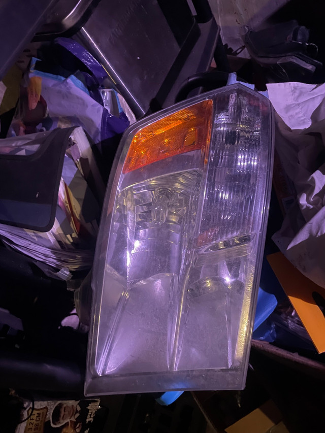 Driver side stock head light in Auto Body Parts in Muskoka