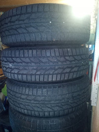 4 great condition tires - P235/70R16- firestone winterforce 2 uv