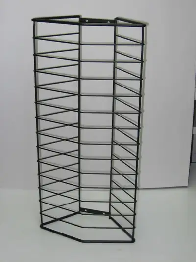 Used but in new condition, DVD / VCR wall holder for up to 28 DVD's or 14 VCR - VHS tapes for each h...