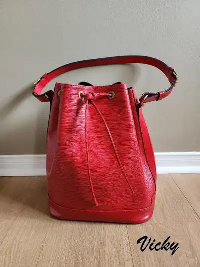Authentic Louis Vuitton Noe GM Epi Leather Bucket Bag, View more