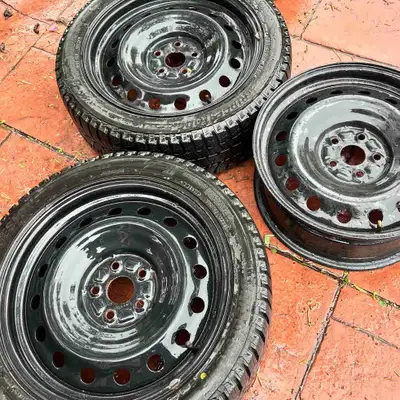 Winter tires used season and a half 4 steel OEM rims and 3 Bridgestone Blizzak tires One tire was na...