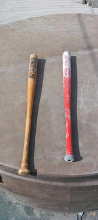 Softball bats, approximately  33"